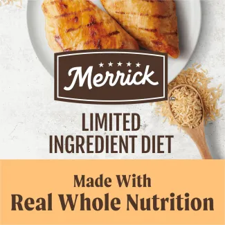 A top down photo of cooked chicken breasts and brown rice on a white background with the Merrick logo overlapping; text below reads "limited ingredient diet. made with real whole nutrition" 